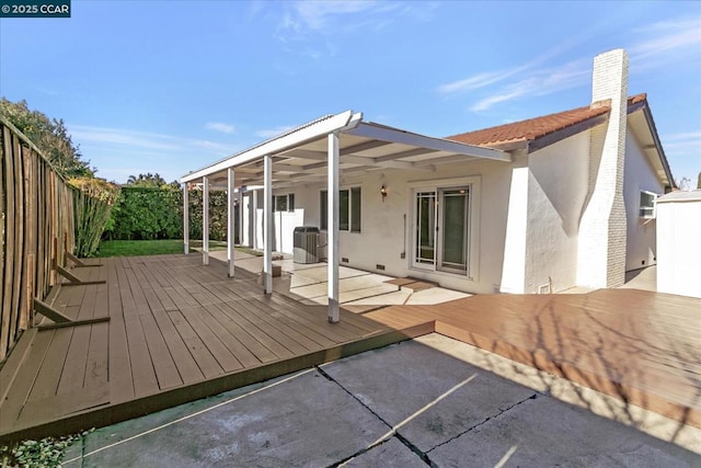 rear view of property featuring a patio, a deck, and central air condition unit