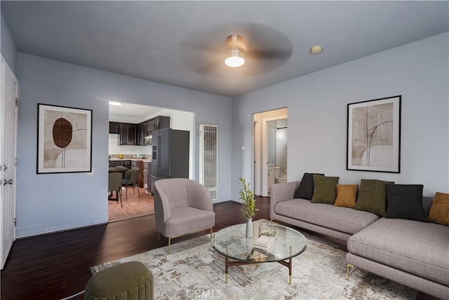 living room featuring dark hardwood / wood-style flooring