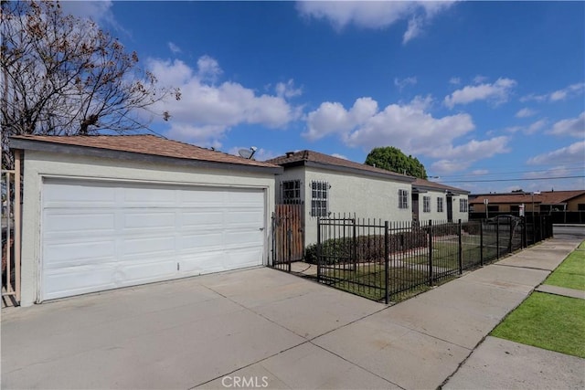 ranch-style home featuring a garage