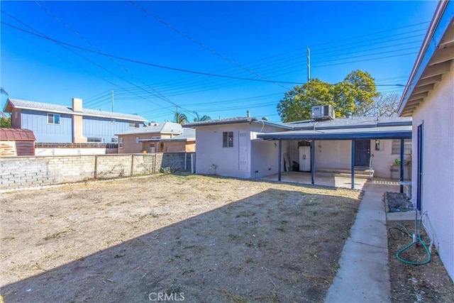 rear view of house featuring a patio area