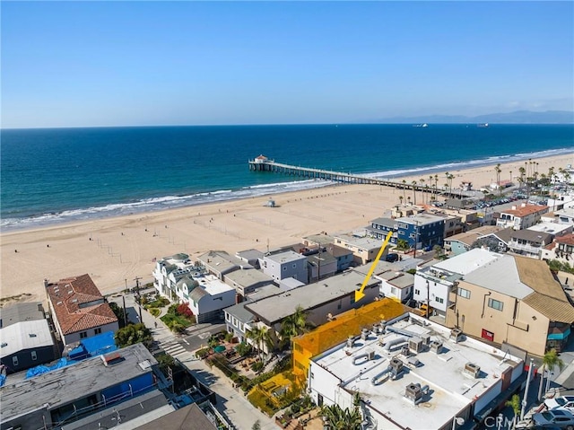 aerial view featuring a water view and a beach view