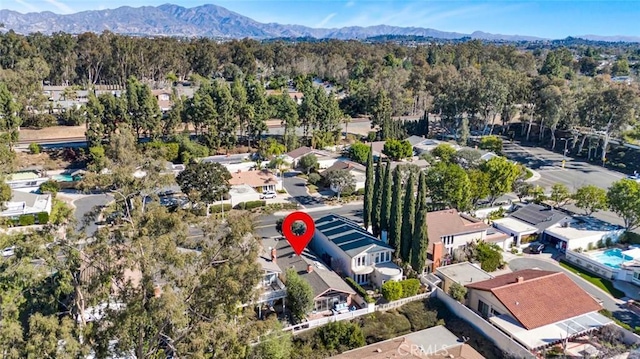 birds eye view of property featuring a mountain view