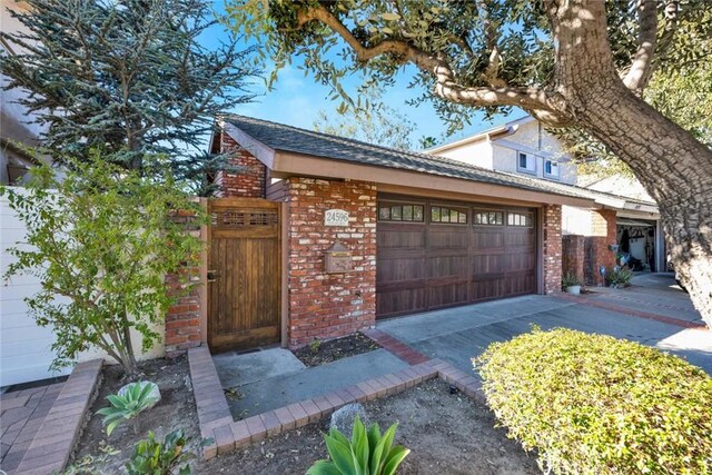 exterior space with a garage