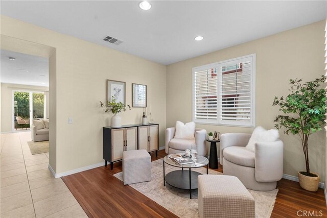 living area featuring light hardwood / wood-style floors