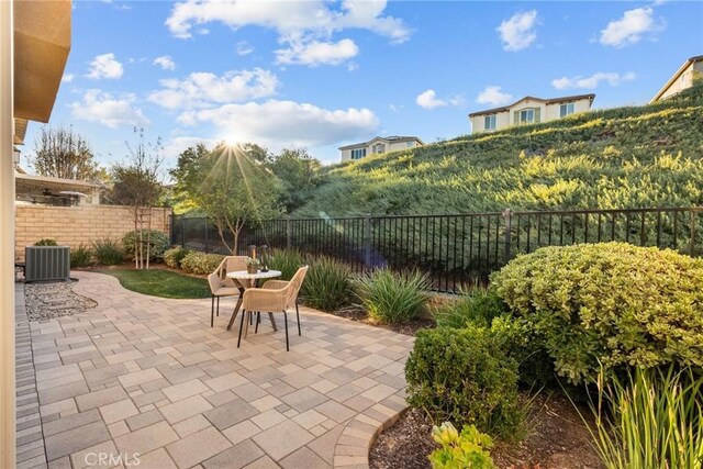 view of patio with central AC