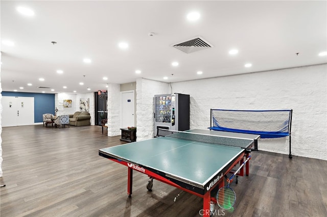 recreation room with hardwood / wood-style flooring