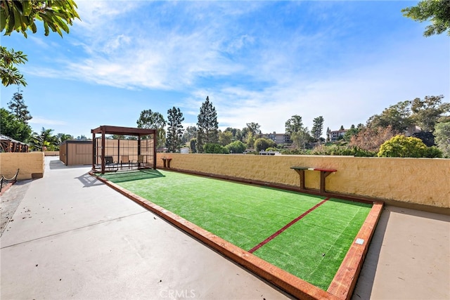 24055 Paseo Del Lago Unit 103, Laguna Woods, CA 92637 - view of property's community featuring a storage unit and an outdoor structure