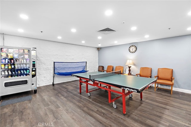 recreation room featuring dark wood-type flooring