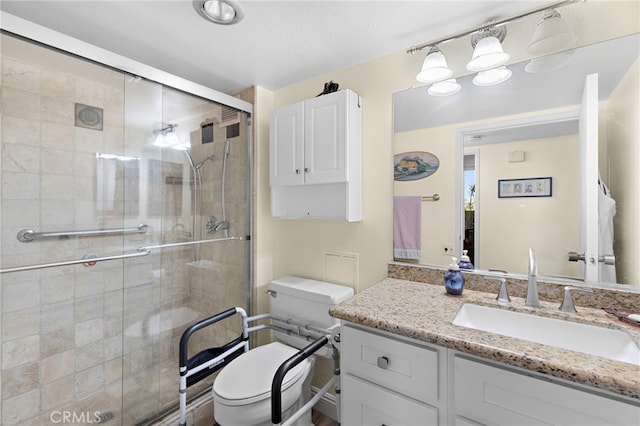 24055 Paseo Del Lago Unit 103, Laguna Woods, CA 92637 - full bath with toilet, a shower stall, and vanity