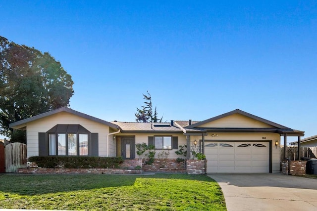 single story home featuring a front lawn and a garage