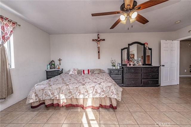 bedroom featuring ceiling fan and light tile patterned floors