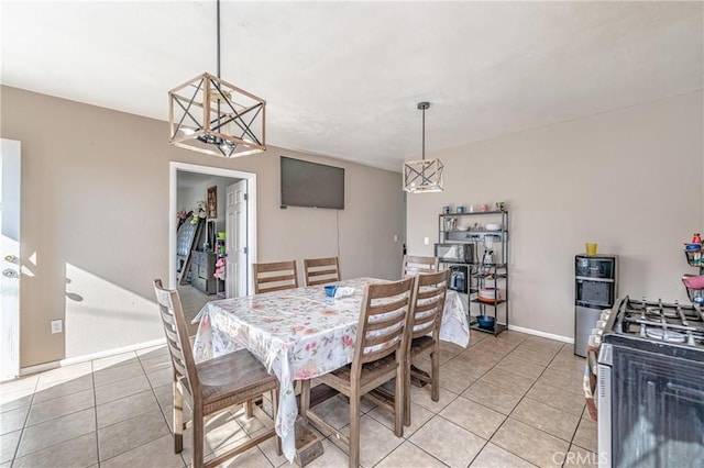 dining room featuring light tile patterned flooring