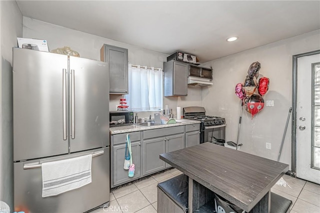 kitchen with light tile patterned floors, gray cabinets, black appliances, and sink