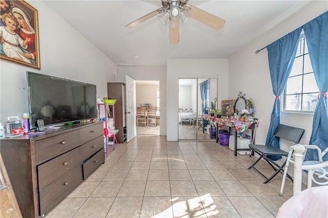 bedroom featuring ceiling fan and light tile patterned floors