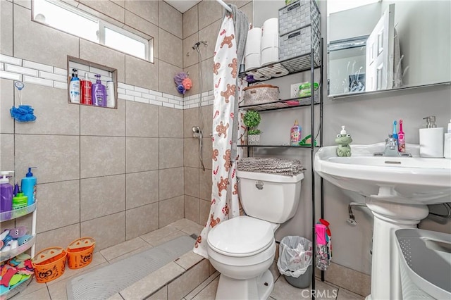 bathroom featuring toilet and walk in shower