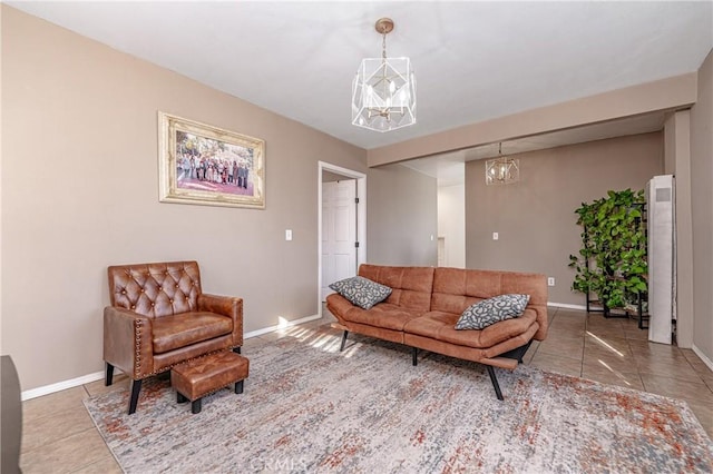 living room featuring tile patterned flooring and an inviting chandelier