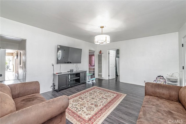 living room with dark hardwood / wood-style floors