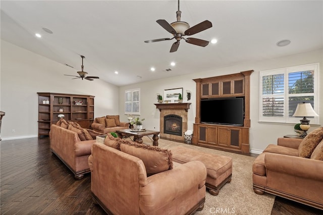 living room with vaulted ceiling, dark wood-type flooring, and ceiling fan