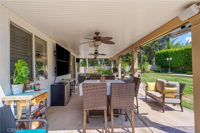 view of patio / terrace with ceiling fan and outdoor lounge area