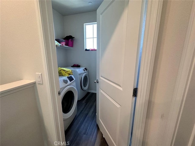 washroom featuring dark hardwood / wood-style floors and separate washer and dryer