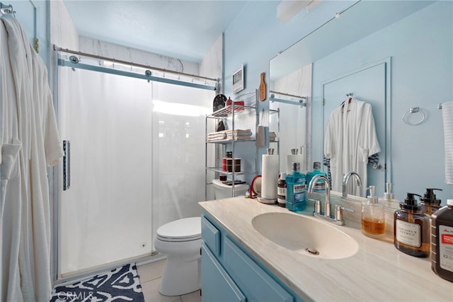 bathroom featuring a shower with door, tile patterned floors, vanity, and toilet