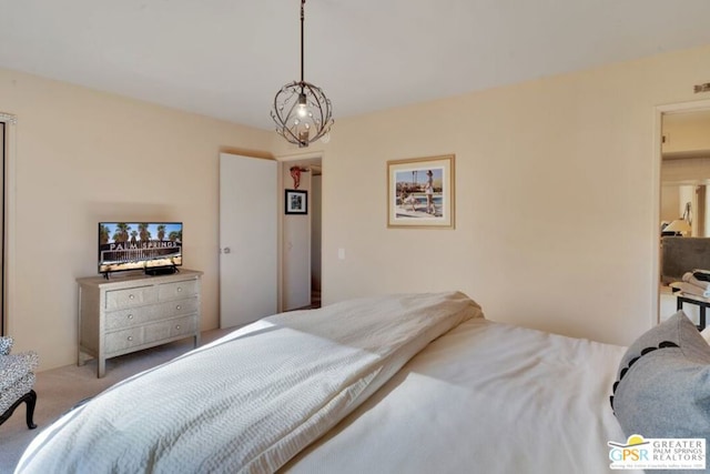 bedroom featuring light carpet