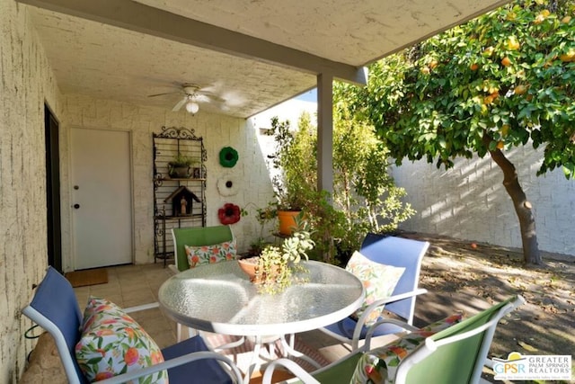 view of patio / terrace featuring ceiling fan