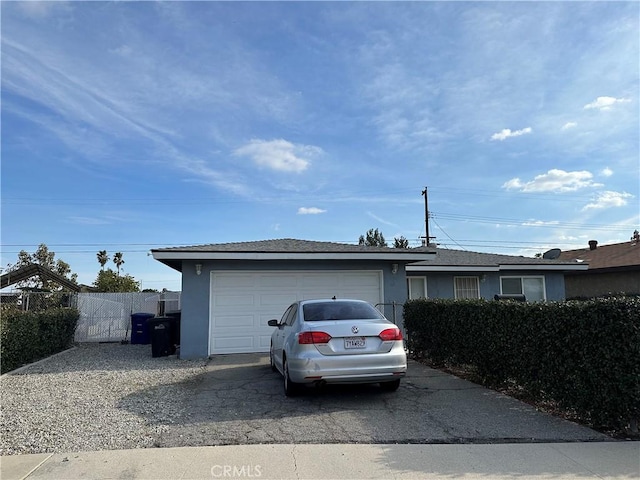 view of side of property with a garage