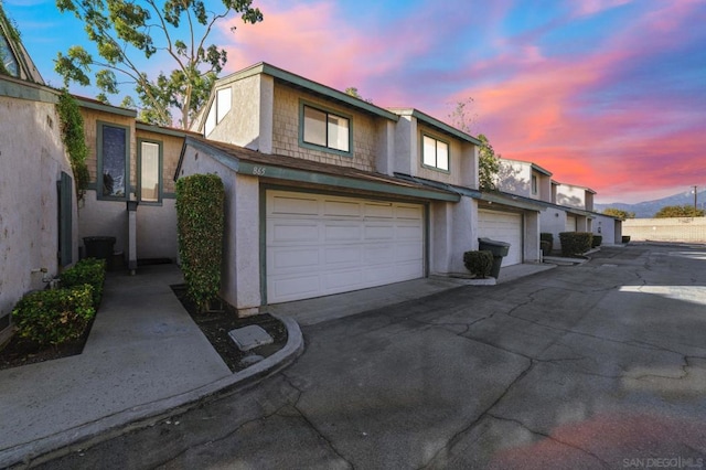 view of front of home with a garage