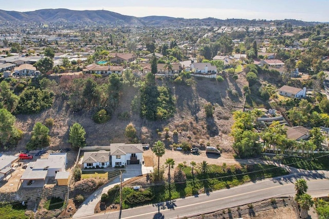 drone / aerial view featuring a mountain view