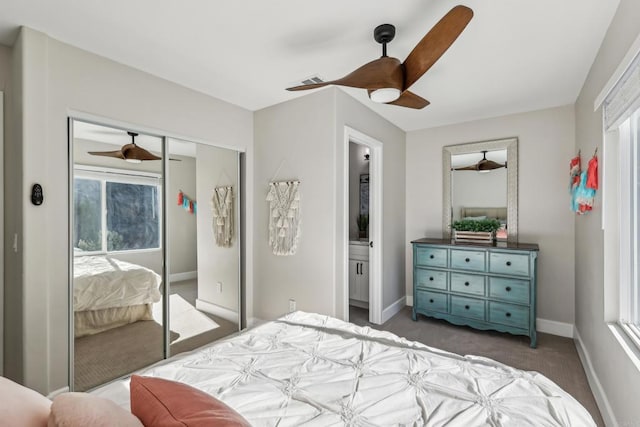 carpeted bedroom featuring a closet and ceiling fan