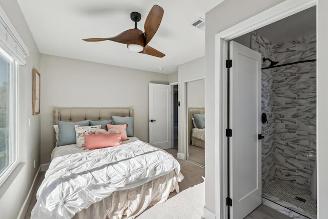 bedroom featuring ceiling fan and a closet