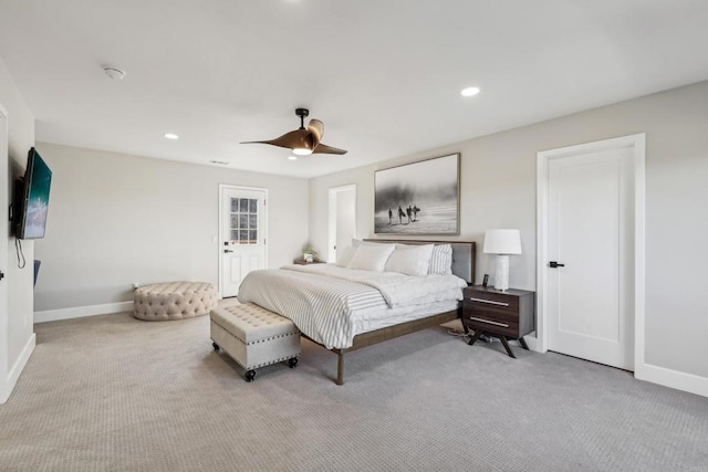 carpeted bedroom featuring ceiling fan