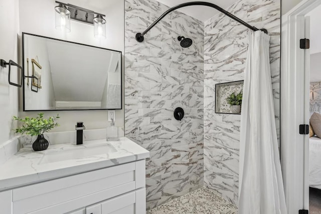 bathroom featuring vanity and a shower with curtain