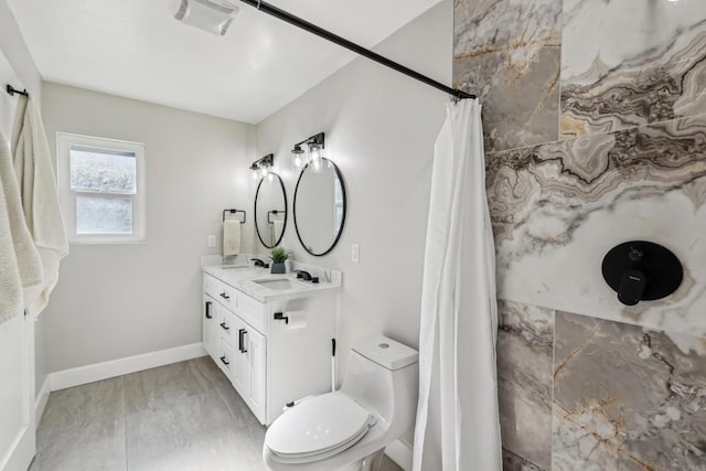 full bathroom with vanity, toilet, and shower / bath combo with shower curtain