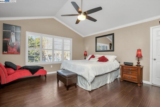 bedroom featuring crown molding, ceiling fan, dark hardwood / wood-style floors, and vaulted ceiling