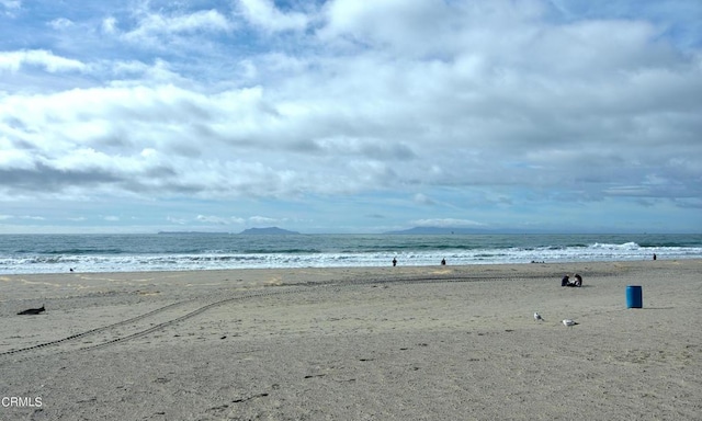 property view of water featuring a beach view