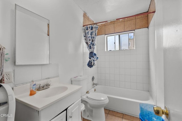 full bathroom featuring shower / bath combo, tile patterned flooring, vanity, and toilet