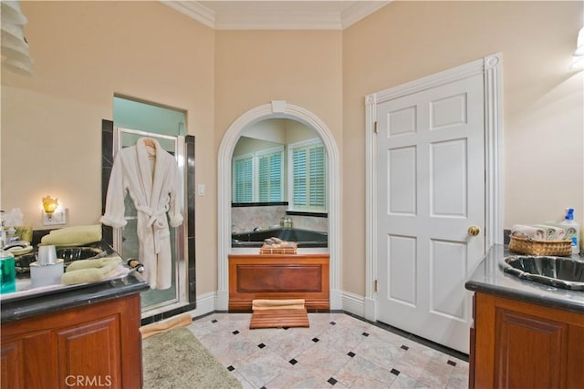 bathroom with ornamental molding, tile patterned flooring, and vanity