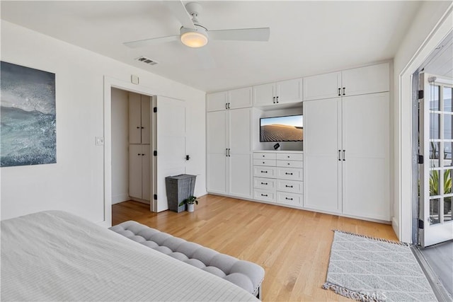 bedroom featuring ceiling fan and light hardwood / wood-style floors