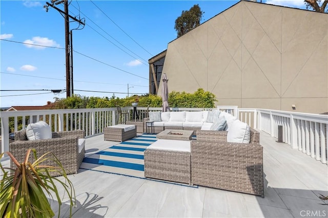 wooden deck with outdoor lounge area