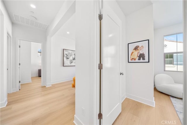 hall featuring light wood-type flooring