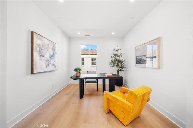 home office with light wood-type flooring