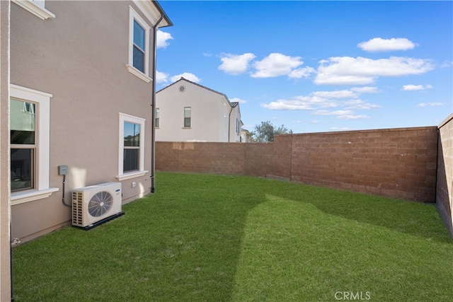 view of yard featuring ac unit