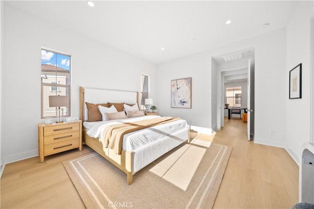 bedroom featuring light hardwood / wood-style flooring