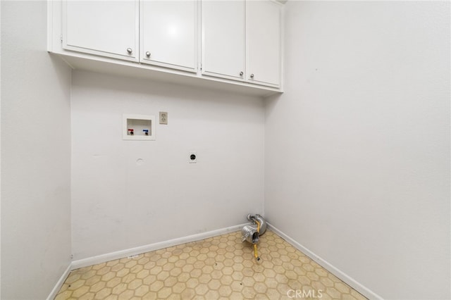 laundry room featuring hookup for a washing machine, cabinets, and hookup for an electric dryer