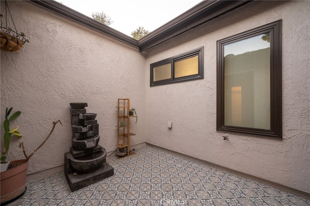 view of side of home featuring a patio