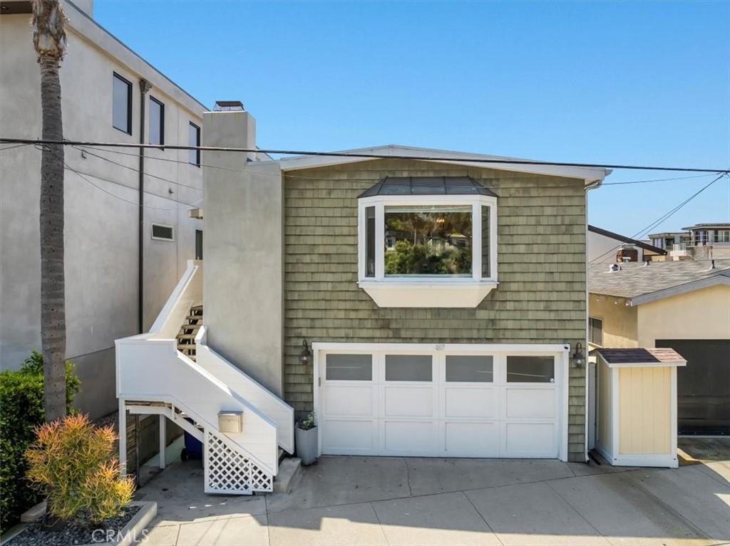 view of property exterior featuring a garage