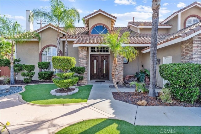 view of front of home featuring a front yard