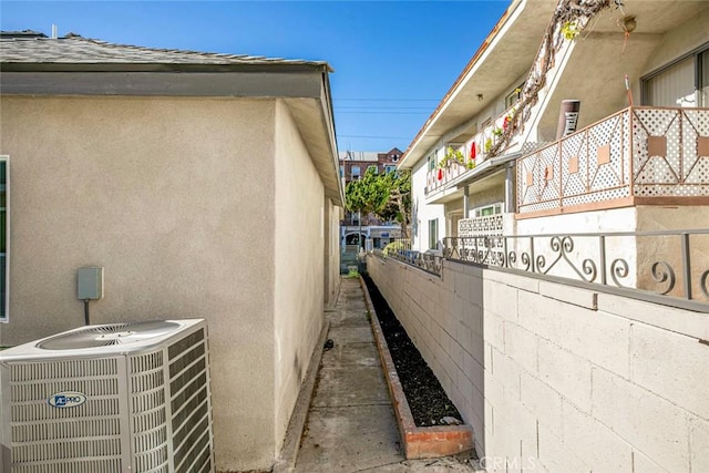 view of property exterior featuring central air condition unit